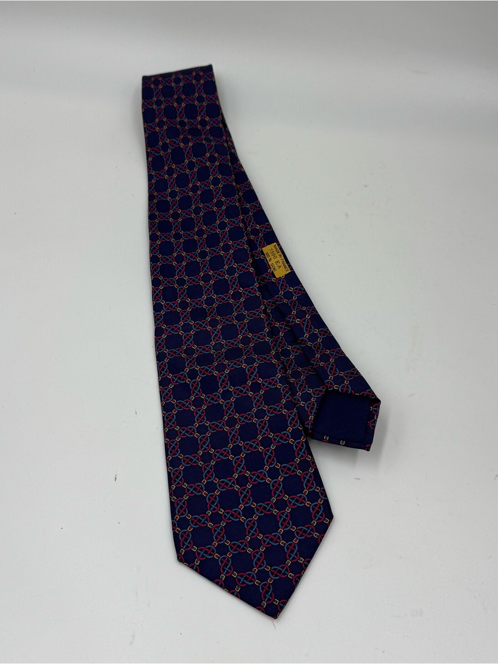 Hermes Navy Silk Tie with Red and Gold Chain Motif